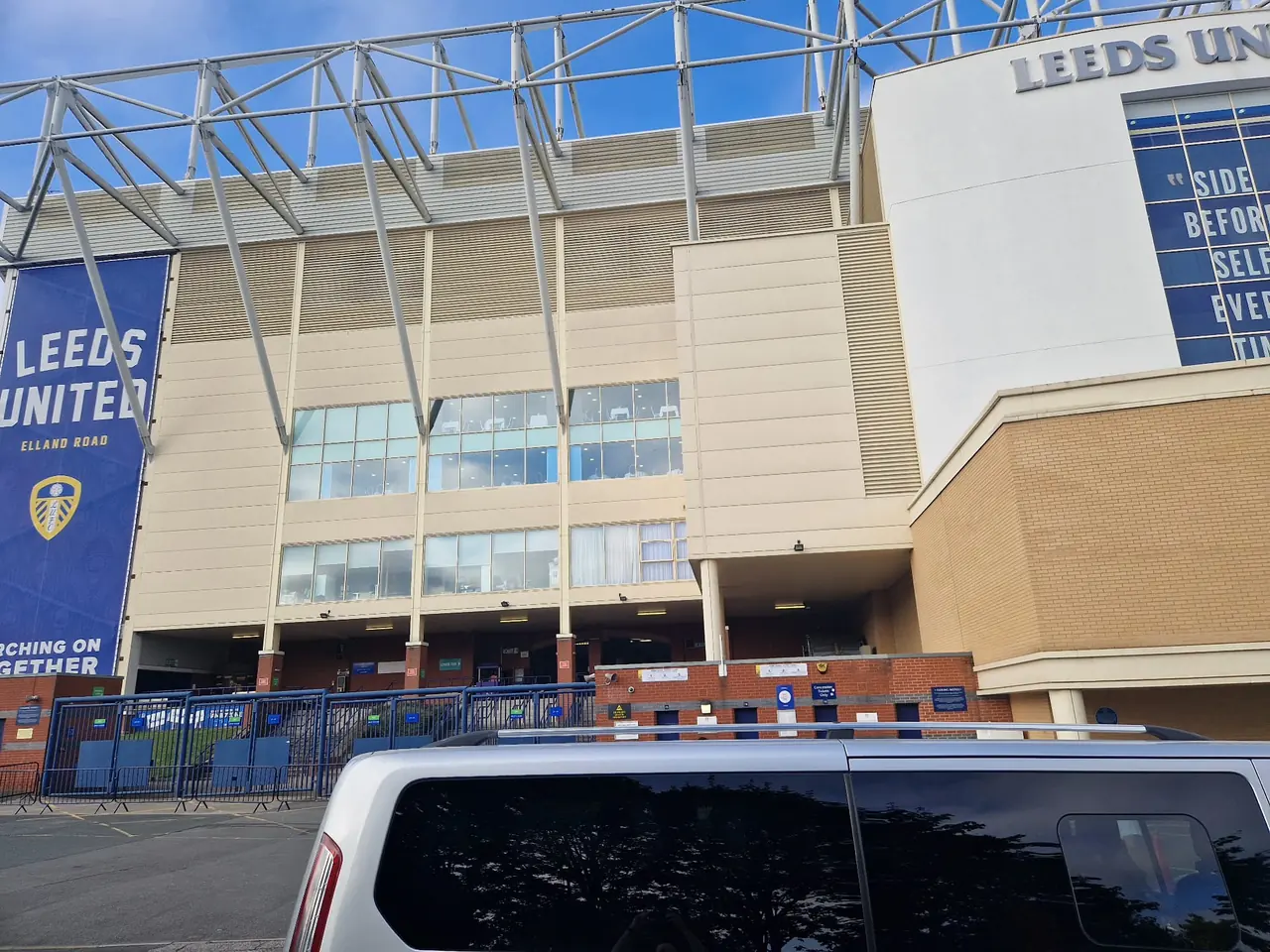B-Direct Travel minibus outside Leeds United’s Elland Road stadium