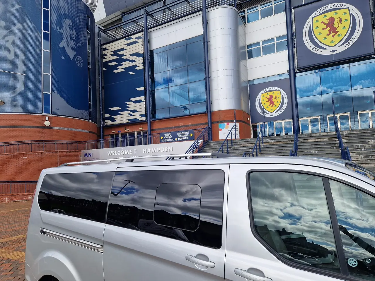 B-Direct Travel minibus outside Hampden Park stadium