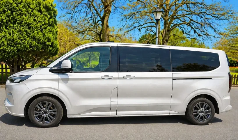 Silver executive minibus